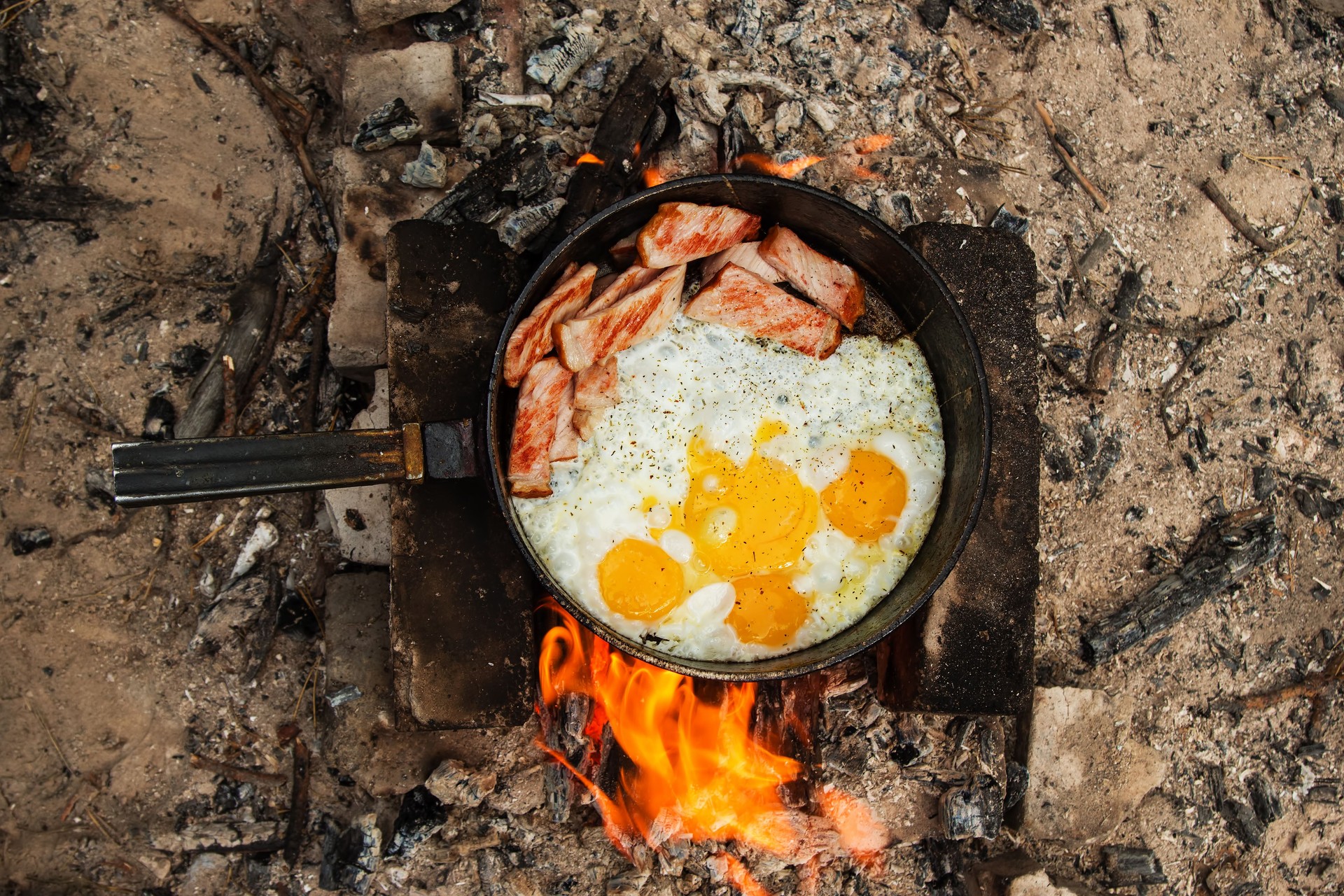 Portable camping cooking kit with gas stove, pots, and utensils for hire in Kenya